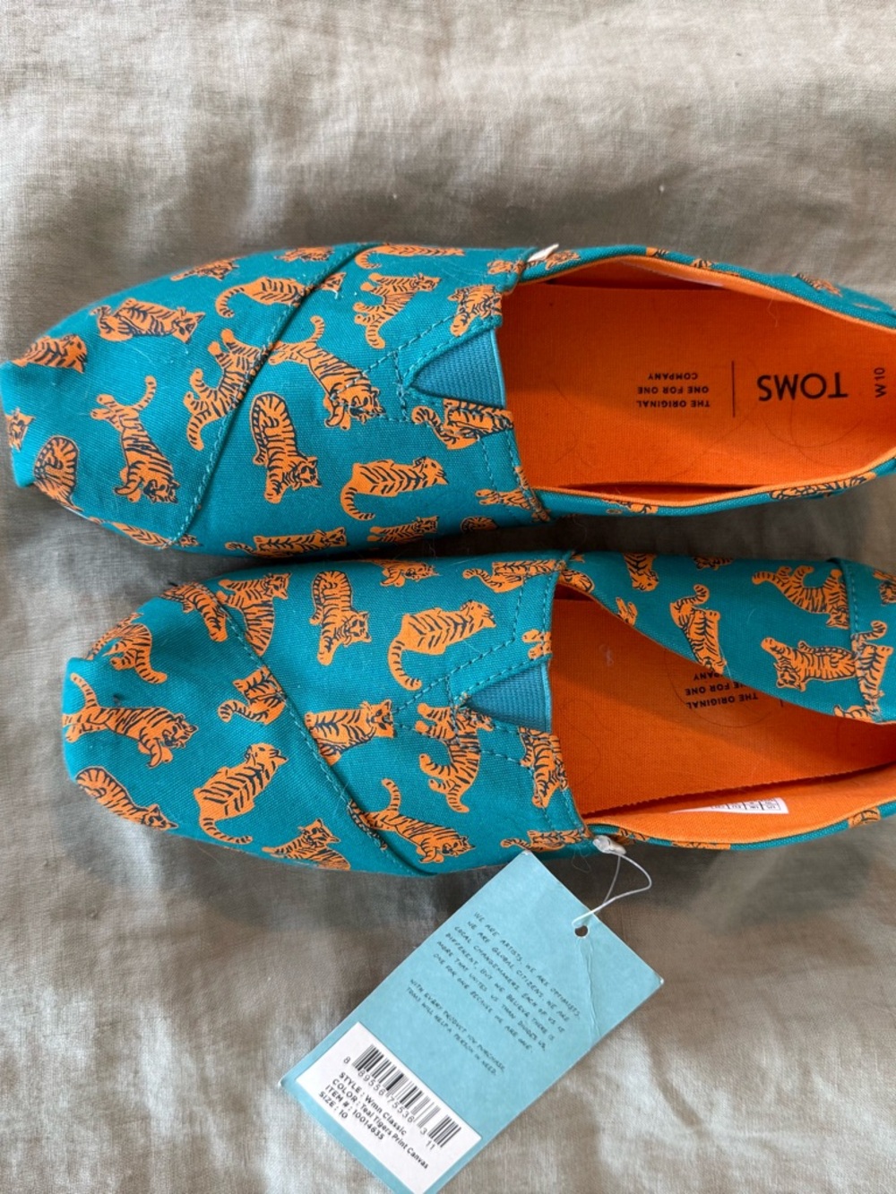 Toms Teal Canvas Slip-Ons with Orange Tiger Pattern